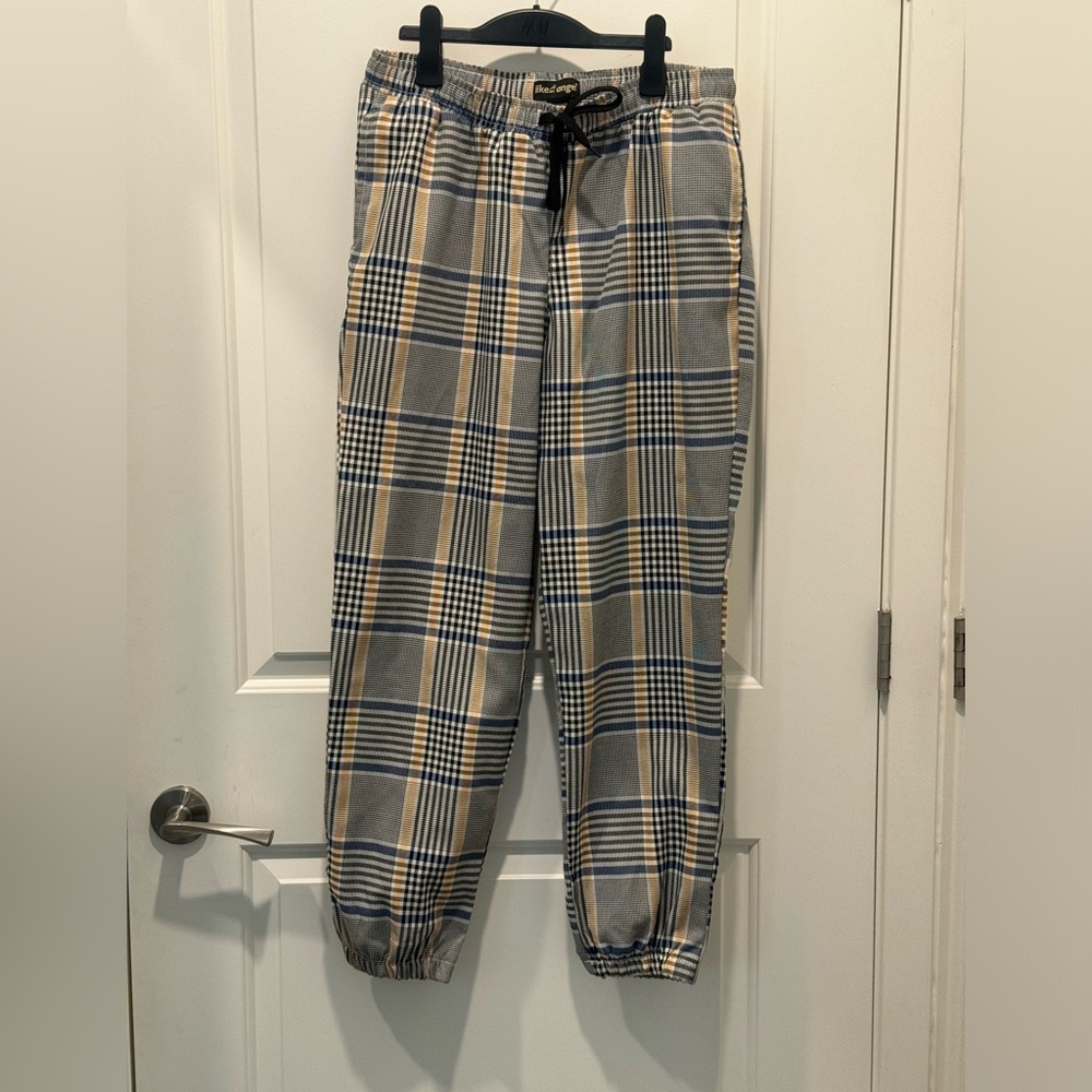 like an angel stylish trousers with pockets and elastic at the bottom size XL